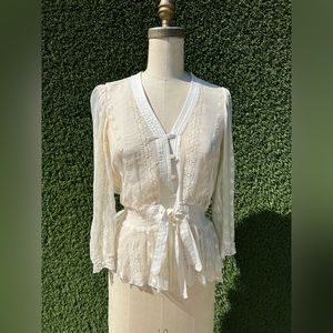 Caché eye-lit blouse